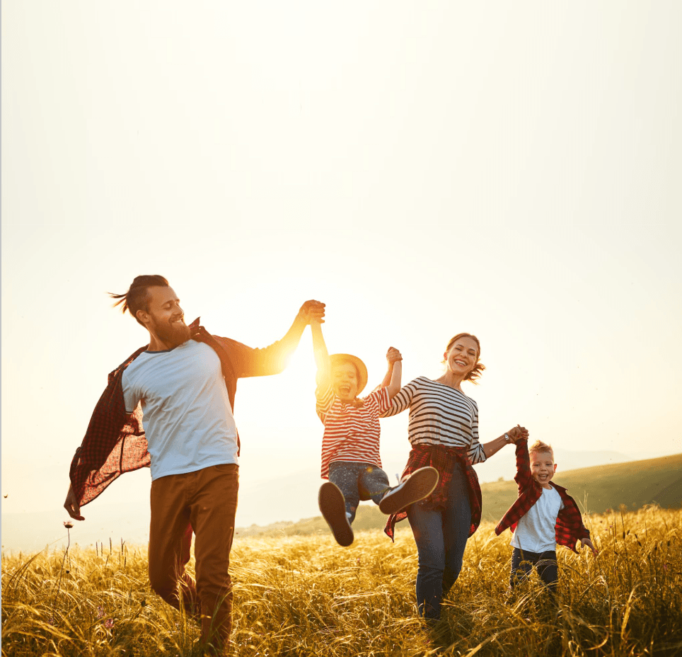 Family in field background